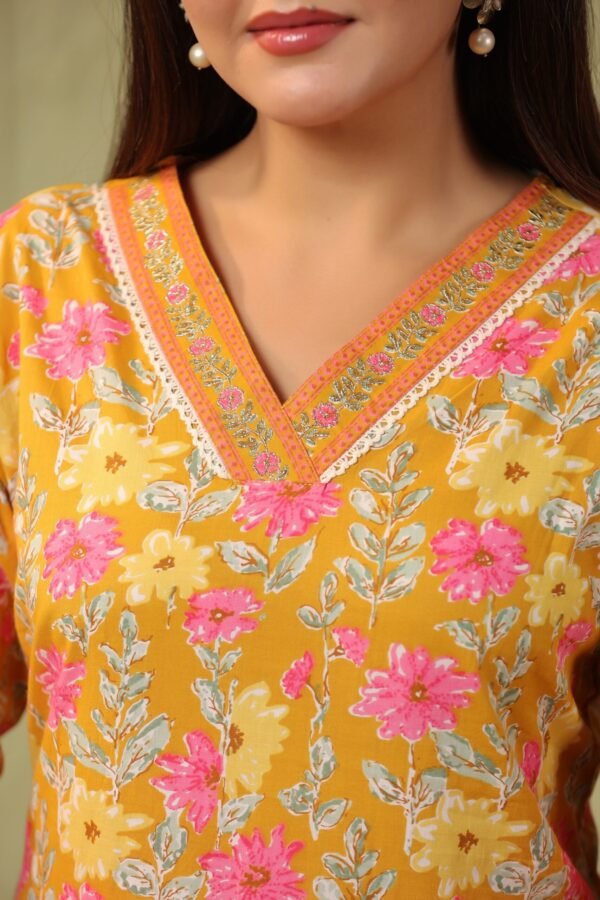 Mustard Yellow Cotton Kurta Set with Pink and White Floral Pattern - Image 2