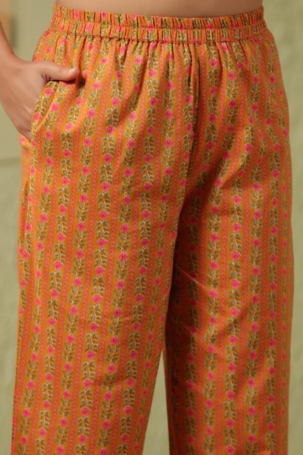 Mustard Yellow Cotton Kurta Set with Pink and White Floral Pattern - Image 3